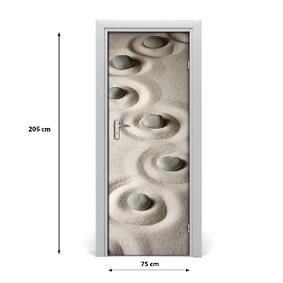 Självhäftande dörrklistermärke Stenar på sanden