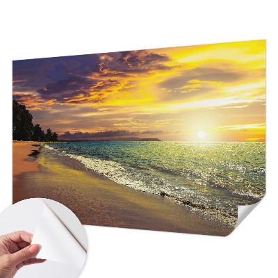 Peel and stick fototapet med motiv av en strand vid solnedgång