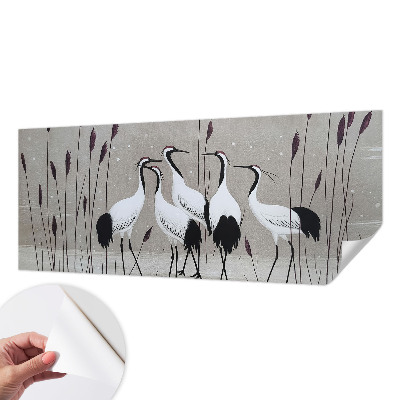 Fototapet barn med en flock tranor