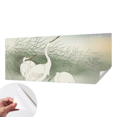 Peel and stick fototapet Hägrar i gräset