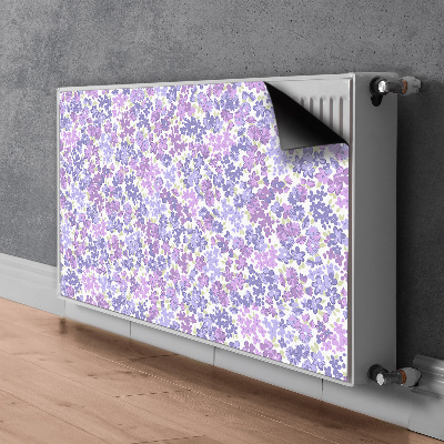 Magnetiskt radiatorskydd Ett fält av förgätmigej
