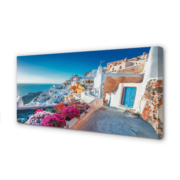 Canvas bild Grekland Byggnader havet blommor