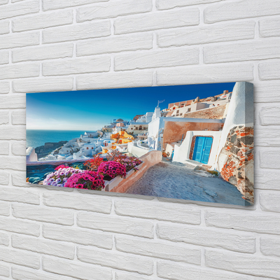 Canvas bild Grekland Byggnader havet blommor