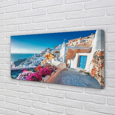 Canvas bild Grekland Byggnader havet blommor