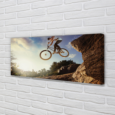 Fototryck canvas Cykel berg moln himmel