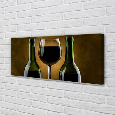 Fototryck canvas Ett glas med 2 flaskor vin