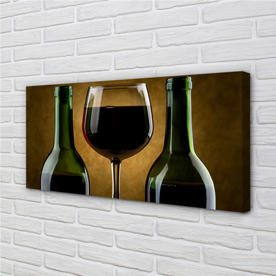 Fototryck canvas Ett glas med 2 flaskor vin