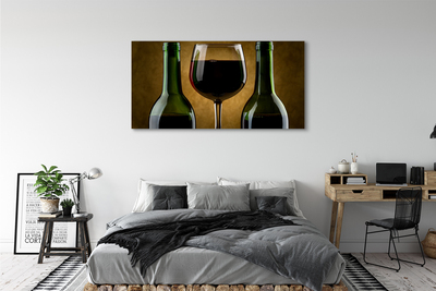 Fototryck canvas Ett glas med 2 flaskor vin