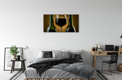 Fototryck canvas Ett glas med 2 flaskor vin