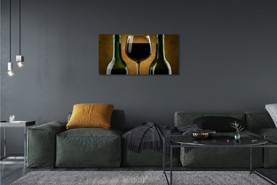 Fototryck canvas Ett glas med 2 flaskor vin