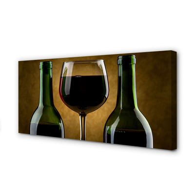 Fototryck canvas Ett glas med 2 flaskor vin