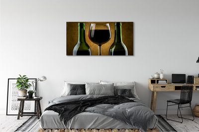 Fototryck canvas Ett glas med 2 flaskor vin