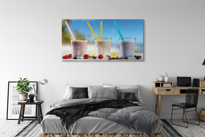 Canvas bild Cocktailglas med färgglada sugrör