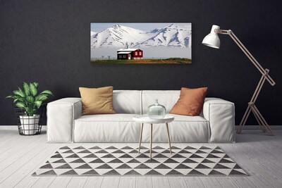 Fototryck canvas Berghus landskap snö