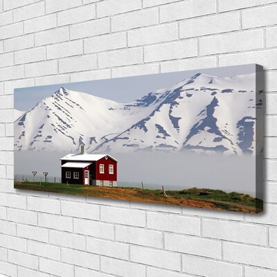 Fototryck canvas Berghus landskap snö