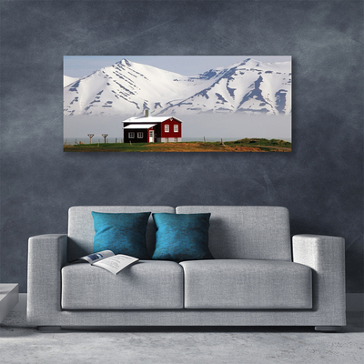 Fototryck canvas Berghus landskap snö