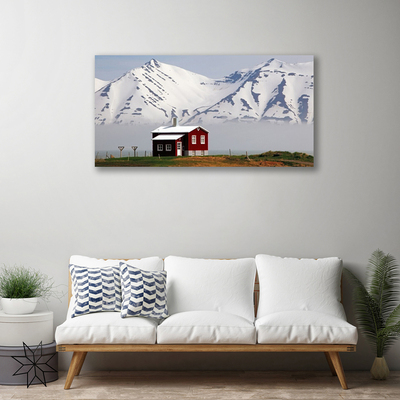 Fototryck canvas Berghus landskap snö