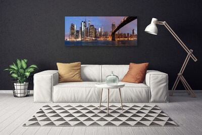 Fototryck canvas Stadsbron huser himmel