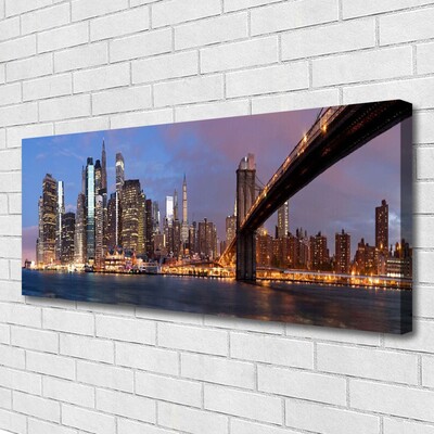 Fototryck canvas Stadsbron huser himmel