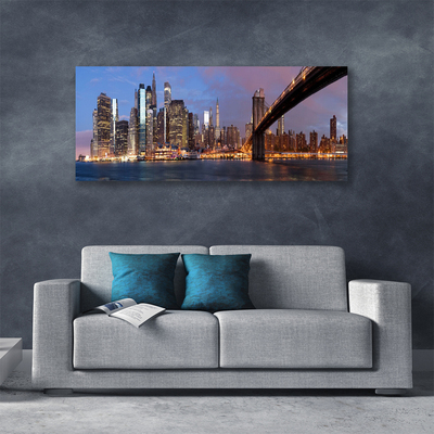 Fototryck canvas Stadsbron huser himmel