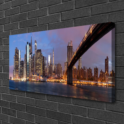 Fototryck canvas Stadsbron huser himmel