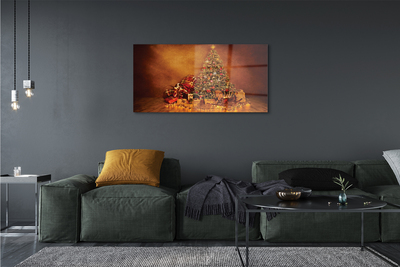 Fototryck på glas Julgran gåvor ljus dekorationer