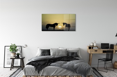 Fototryck på glas Solnedgångsfält med enhörningar
