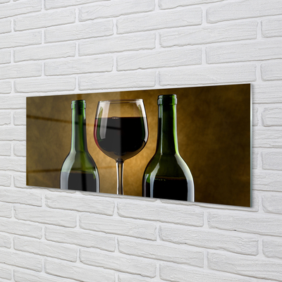 Glas panel Ett glas med 2 flaskor vin