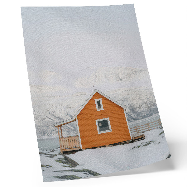 Dekorativ väggaffisch Orange hus snöiga berg minimalistisk ram