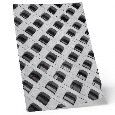 Poster En minimalistisk fasad full av upprepade former
