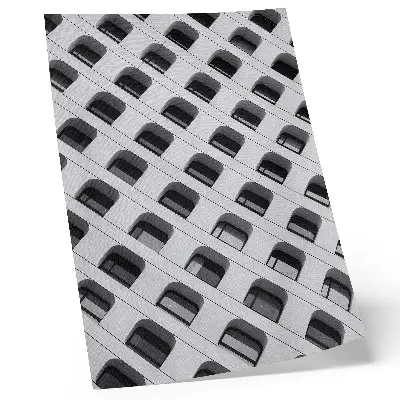 Poster en minimalistisk fasad med upprepade former
