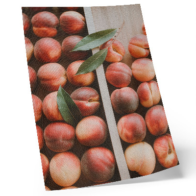Poster Persikor med blad i en trälåda