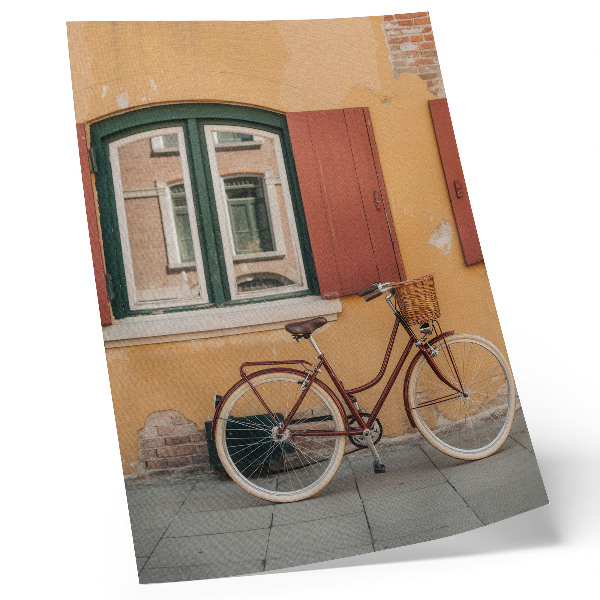 Dekorativ väggaffisch En cykel mot bakgrund av en färgglad retrofasad