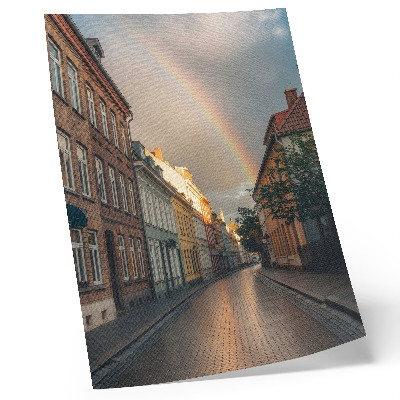 Poster Färgglada hyreshus, regnbåge, molnig himmel