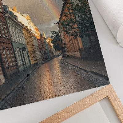Poster Färgglada hyreshus, regnbåge, molnig himmel