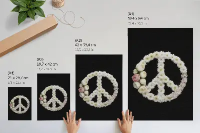 Poster blommor formade som en fredssymbol på svart bakgrund