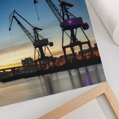 Poster Tranor mot bakgrund av ett dynamiskt solnedgångslandskap