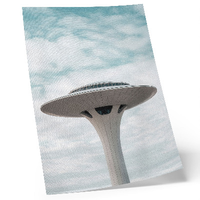 Hållbar väggposter En futuristisk byggnad mot himlen