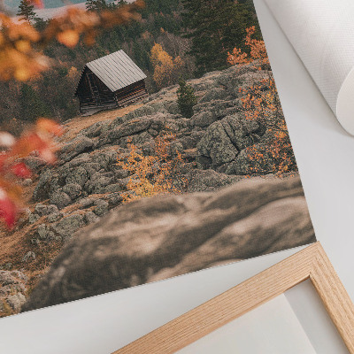 Dekorativ väggaffisch Ett hus på en klippa bland träd, höst, fridfull natur