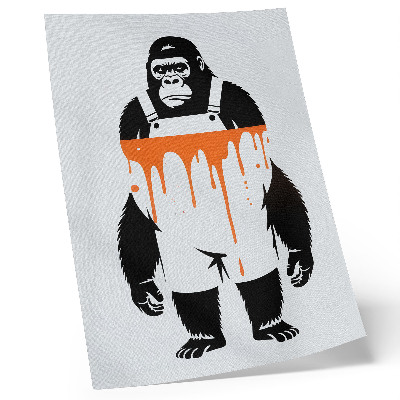 Dekorativ väggaffisch En gorilla i overall mot en vibrerande orange bakgrund
