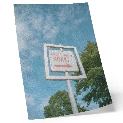 Väggposter vit tavla mot en blå himmel