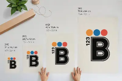 Dekorativ väggaffisch med bokstav i geometrisk stil och färgglada droppar