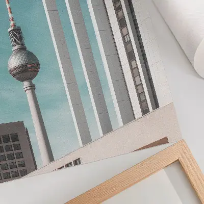 Dekorativ väggaffisch minimalistiskt torn med moderna byggnader mot blå himmel