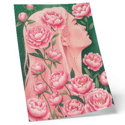 Hållbar väggposter En kvinna bland rosa pioner mot en grön bakgrund