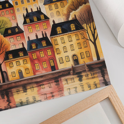 Poster En stämningsfull stad på natten med månen på himlen