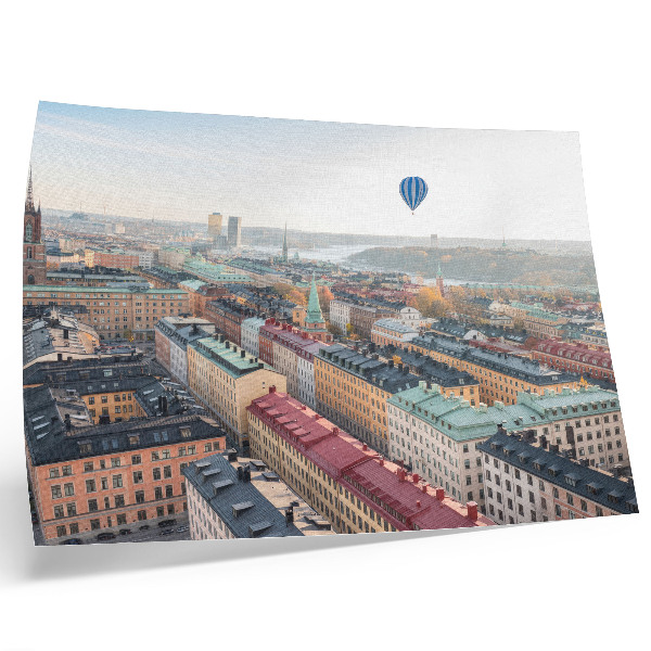 Väggposter Färgglad stadsballong över byggnadshimmel