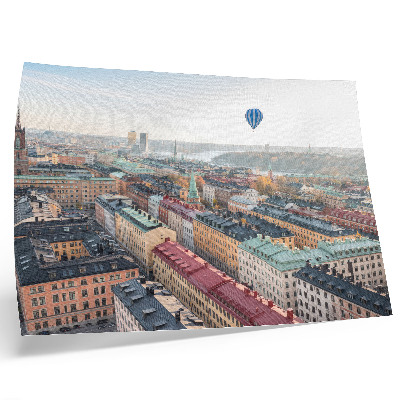 Väggposter Färgglad stadsballong över byggnadshimmel