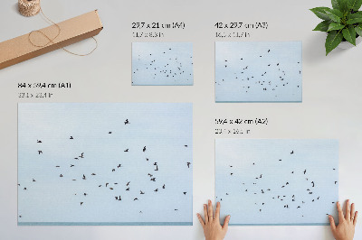 Poster till sovrum En flock fåglar över det blå havet