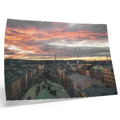 Väggposter med motiv av solnedgång över stadens panorama