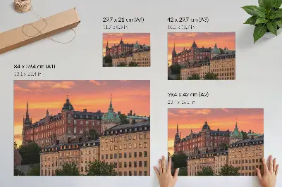 Poster solnedgång med charmiga byggnader och historisk atmosfär
